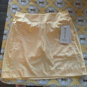 NWT size 4. Athleta Brooklyn skort 16”. Yellow